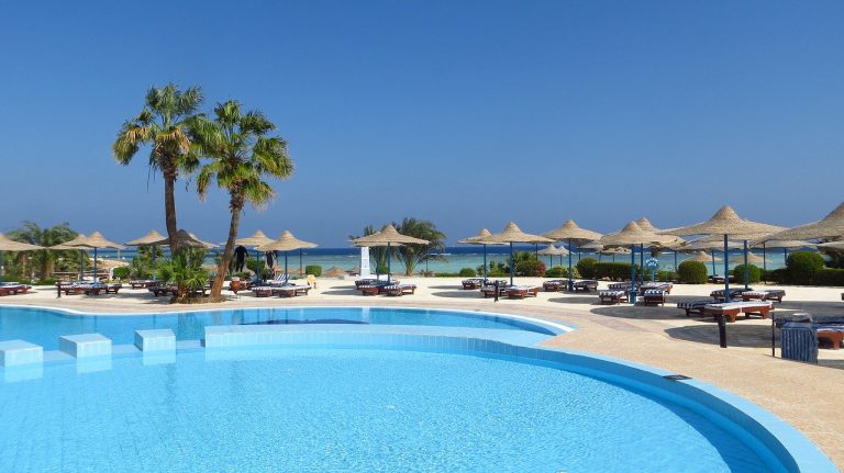 pool, palm trees, hotel